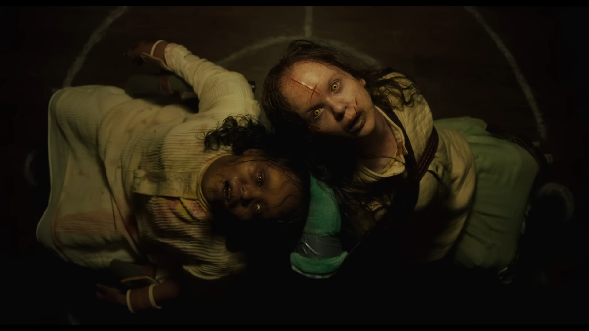 Katherine (Olivia O’Neill) and Angela (Lidya Jewett) succumb to Lamashtu (Lize Johnston) in The Exorcist: Believer (2023), Universal Pictures