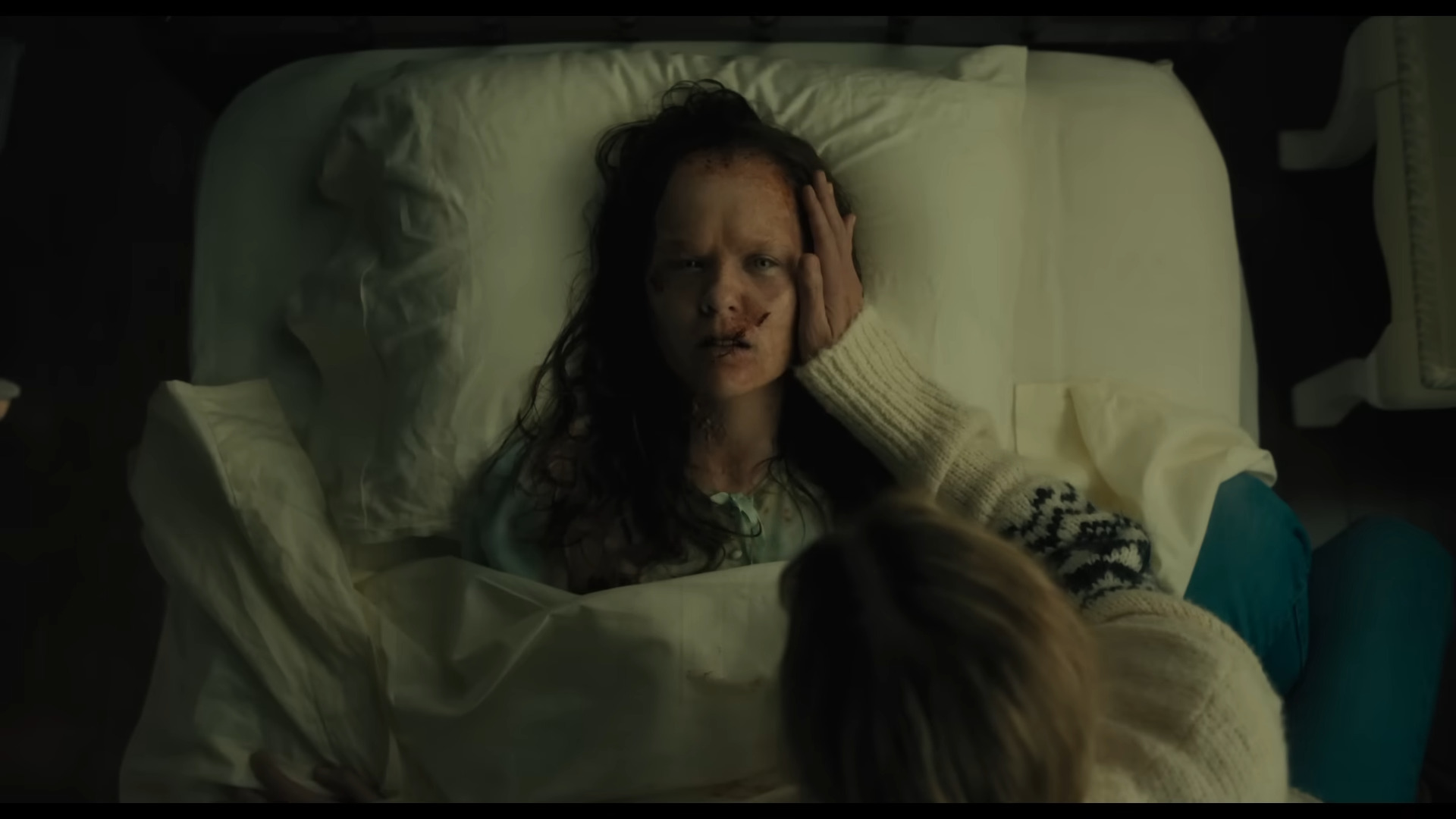 Chris MacNeil (Ellen Burstyn) pays a visit to Katherine (Olivia O'Neill) in The Exorcist: Believer (2023), Universal Pictures