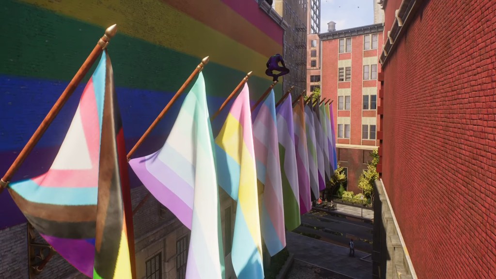 Miles Morales (Nadji Jeter) perches upon a row of Pride Flags in Marvel's Spider-Man 2 (2023), Insomniac Games