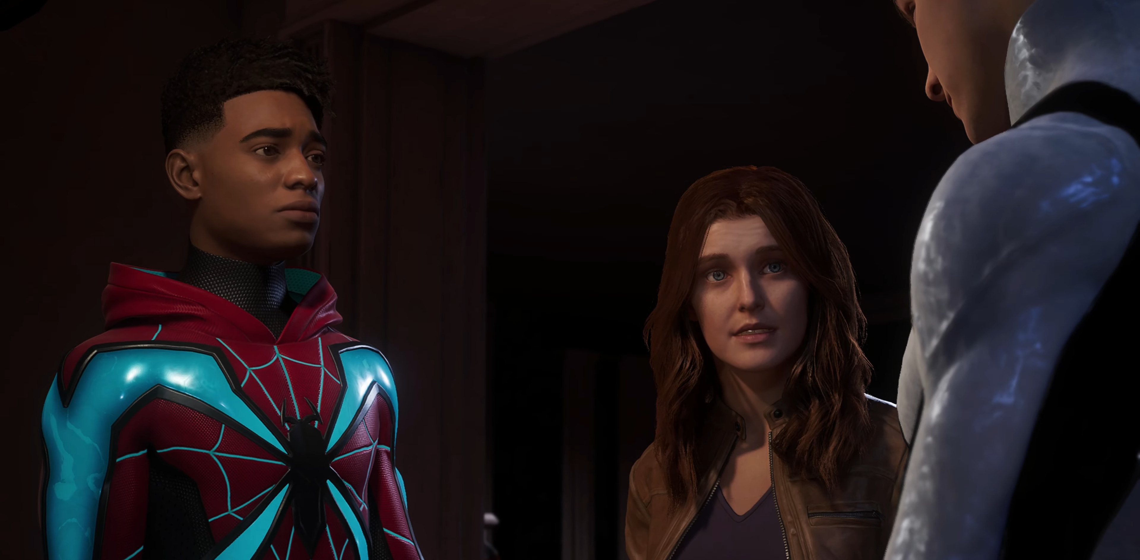Miles (Nadji Jeter), MJ (Laura Bailey), and Peter formulate a plan in Marvel's Spider-Man 2 (2023), Insomniac Games