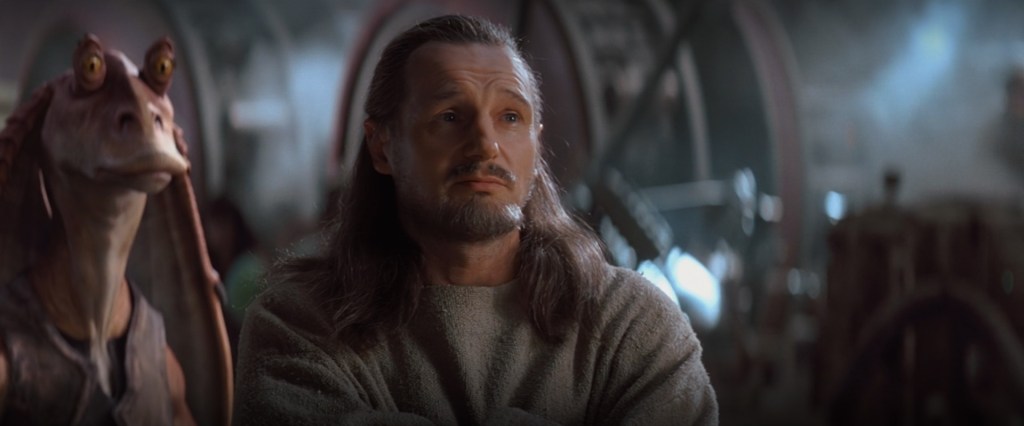 Qui-Gon Jinn (Liam Neeson) makes a bet with Watto (Andy Secombe) in Star Wars Episode I: The Phantom Menace (1999), Lucasfilm Ltd.