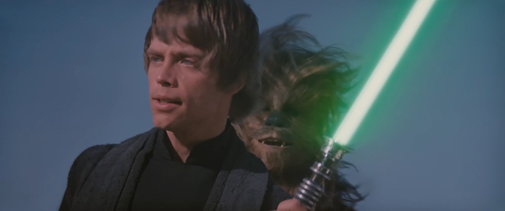 Luke Skywalker (Mark Hamill) ignites his green Lightsaber for the first time in Star Wars: Episode VI - Return of the Jedi (1985), Lucasfilm