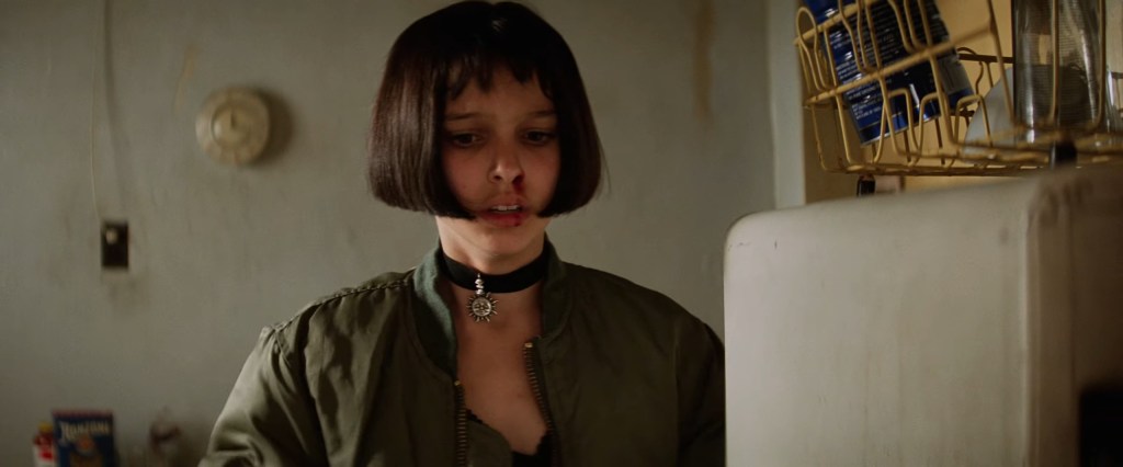 The reality of her parents' murder begins to set in for Mathilda (Natalie Portman) in Léon: The Professional (1994), Gaumont
