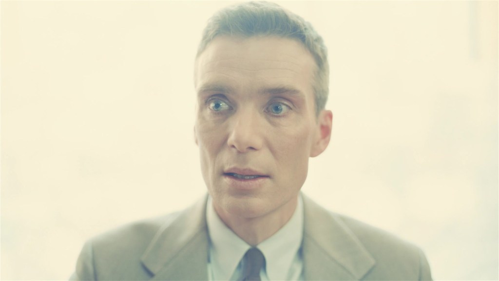 Dr. Robert Oppenheimer (Cillian Murphy) realizes the gravity of what his discovery has wrought in Oppenheimer (2023), Warner Bros. Pictures