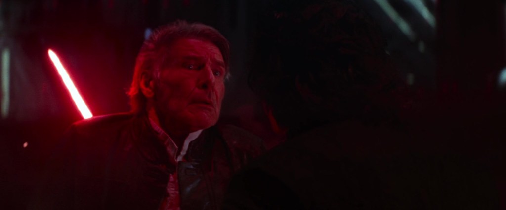 Han Solo (Harrison Ford) meets his end at the hands of his son, Kylo Ren (Adam Driver), in Star Wars - Episode VII: The Force Awakens (2015), Disney