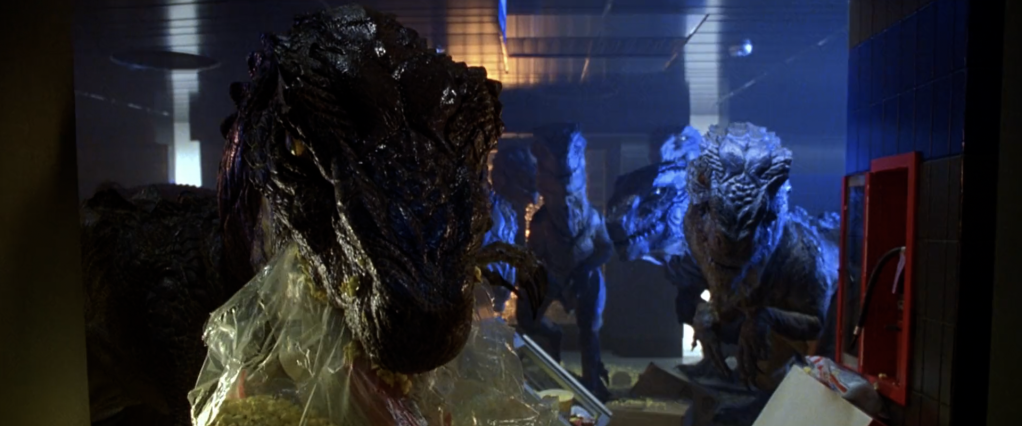 Dr. Niko Tatopoulos (Matthew Broderick) is greeted by a group of Baby Zillas in Godzilla (1998), TriStar Pictures