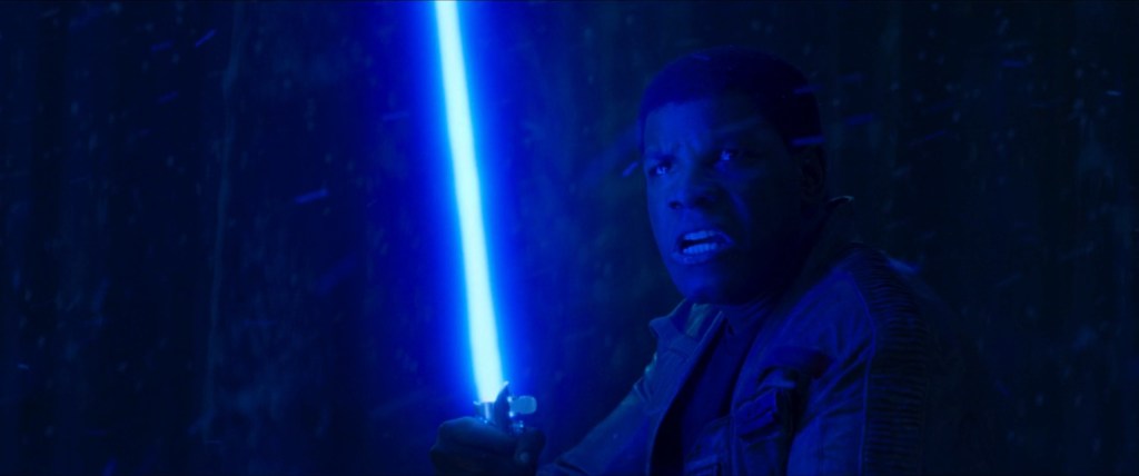 Finn (John Boyega) faces Kylo Ren (Adam Driver) in Star Wars Episode VII: The Force Awakens (2015), Lucasfilm Ltd.