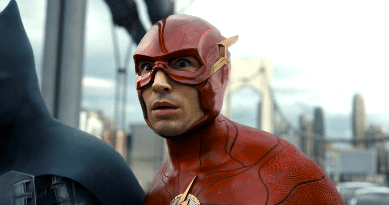 Flash (Ezra Miller) realizes Batman (Ben Affleck) is being affected by Wonder Woman's (Gal Gadot) Lasso of Truth in The Flash (2023), Warner Bros. Pictures