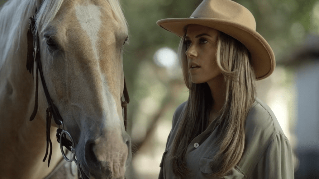 Jana Kramer as Lexie Crenshaw in A Cowboy Christmas Romance (2023), Lifetime