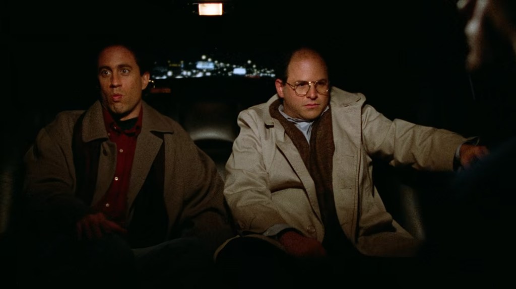 Jerry Seinfeld (Jerry Seinfeld) and George (Jason Alexander) inadvertently pose as members of the Aryan Union Neo-Nazi group in Seinfeld Season 3 Episode 19 The Limo (1992), NBC
