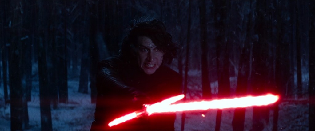 Kylo Ren (Adam Driver) demands Finn (John Boyega) return Luke Skywalker's (mark Hamill) lightsaber in Star Wars Episode VII: The Force Awakens (2019), Lucasfilm Ltd.