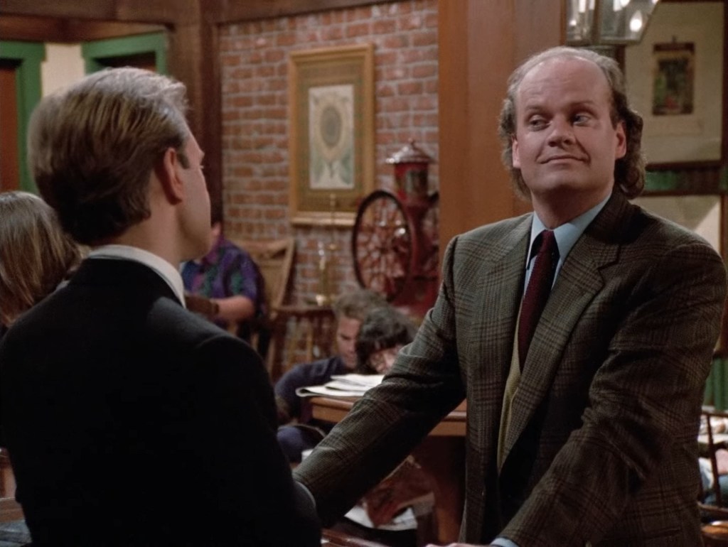 Niles (David Hyde Pierce) gives his brother Frasier (Kelsey Grammer) a backhanded compliment in Frasier Season 1 Episode 1 The Good Son (1993), Paramount Network Television