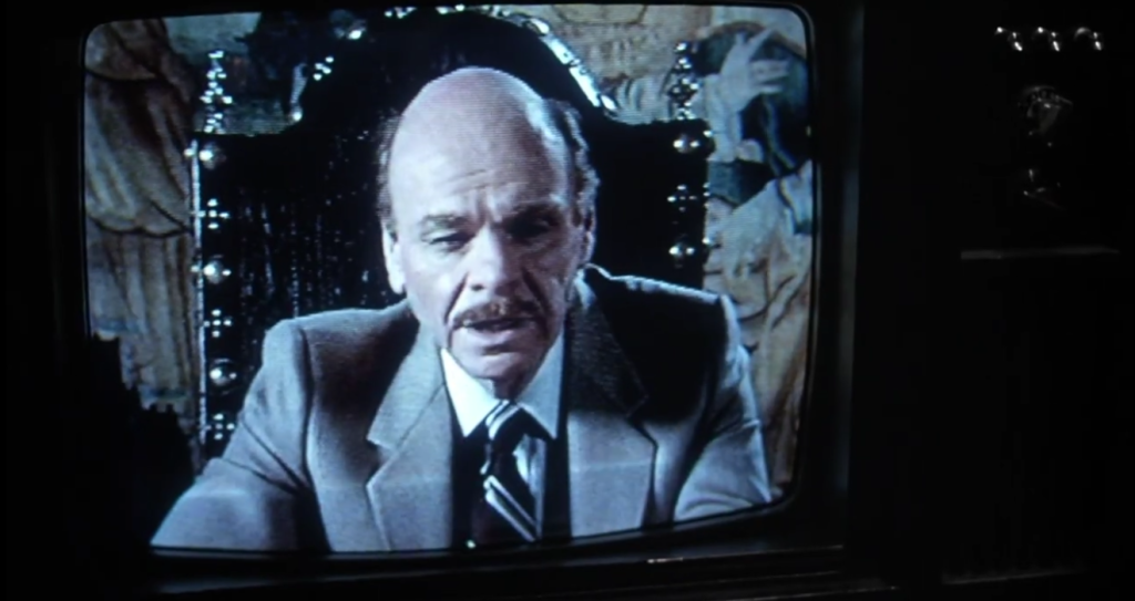 Brian O'Blivion (Jack Creley) tells the world on videotape in Videodrome (1983), Universal Pictures