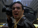 Victor Palotti (Hank Azaria) survives Godzilla's first attack in Godzilla (1998), TriStar Pictures