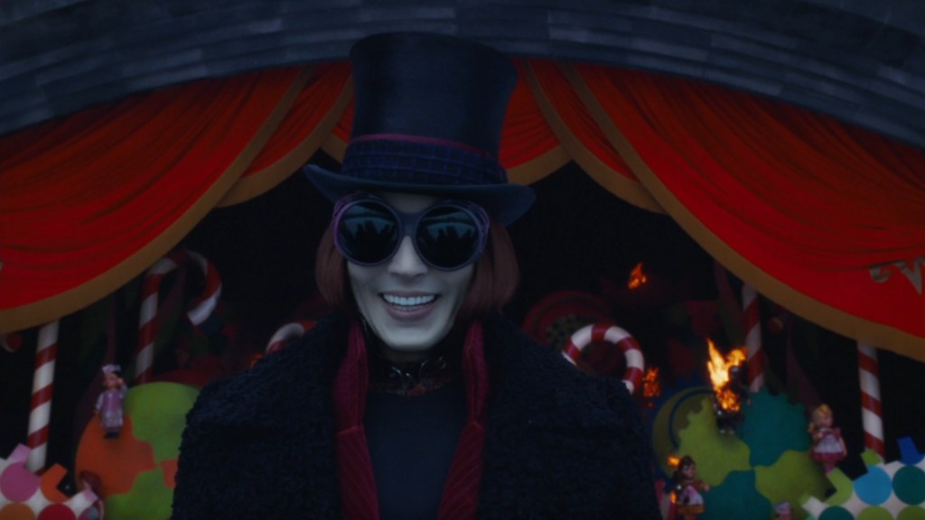 Willy Wonka (Johnny Depp) makes his grandiose entrance in Charlie and the Chocolate Factory (2005), Warner Bros. Pictures