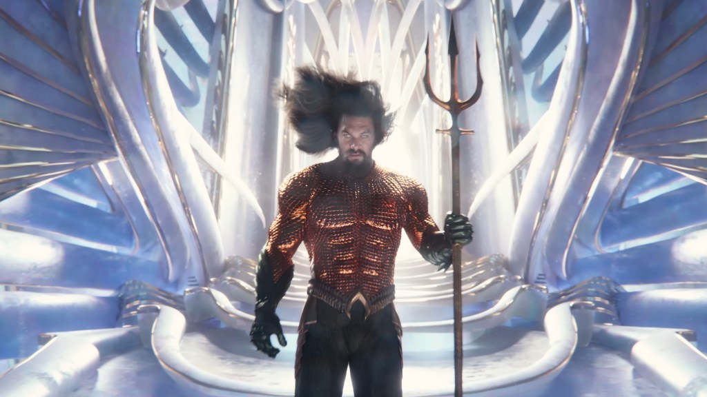 Arthur (Jason Momoa) contemplates his spot upon the throne in Aquaman and the Lost Kingdom (2023), Warner Bros. Discovery