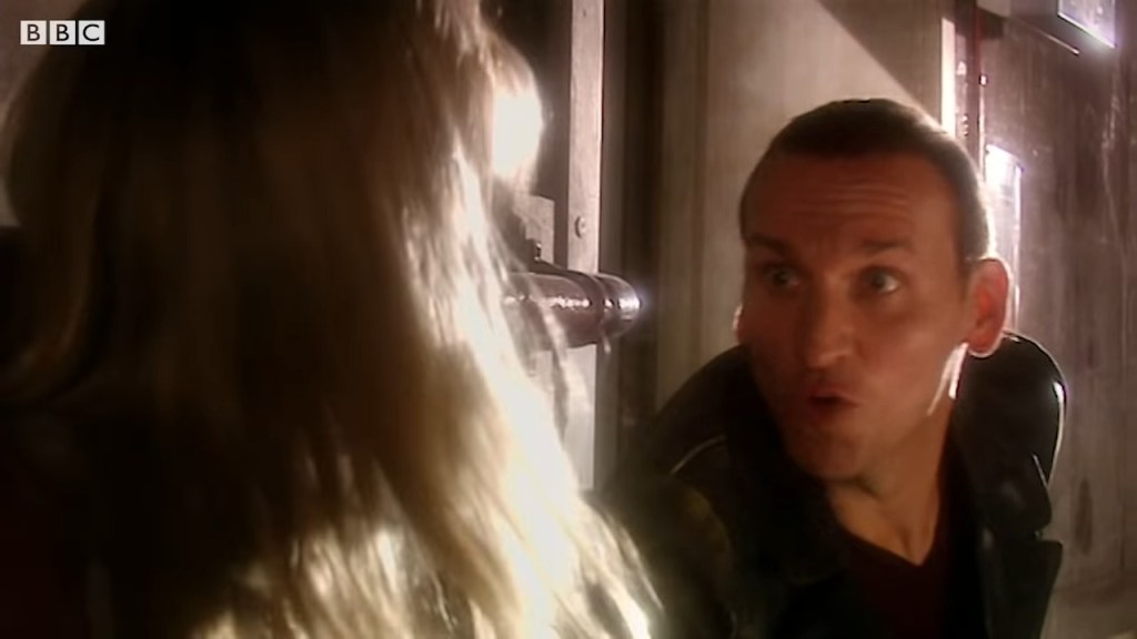 The Doctor (Christopher Eccleston) makes the acquaintance of Rose Tyler (Billie Piper) in Doctor Who Series 1 Episode 1 "Rose" Worldwide, BBC