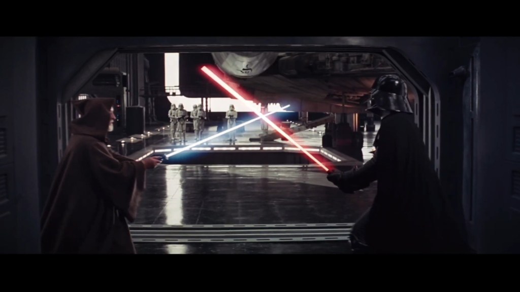Obi-Wan Kenobi (Sir Alec Guinness) faces off against Darth Vader (David Prowse/James Earl Jones) in Star Wars - Episode IV: A New Hope (1977), Lucasfilm