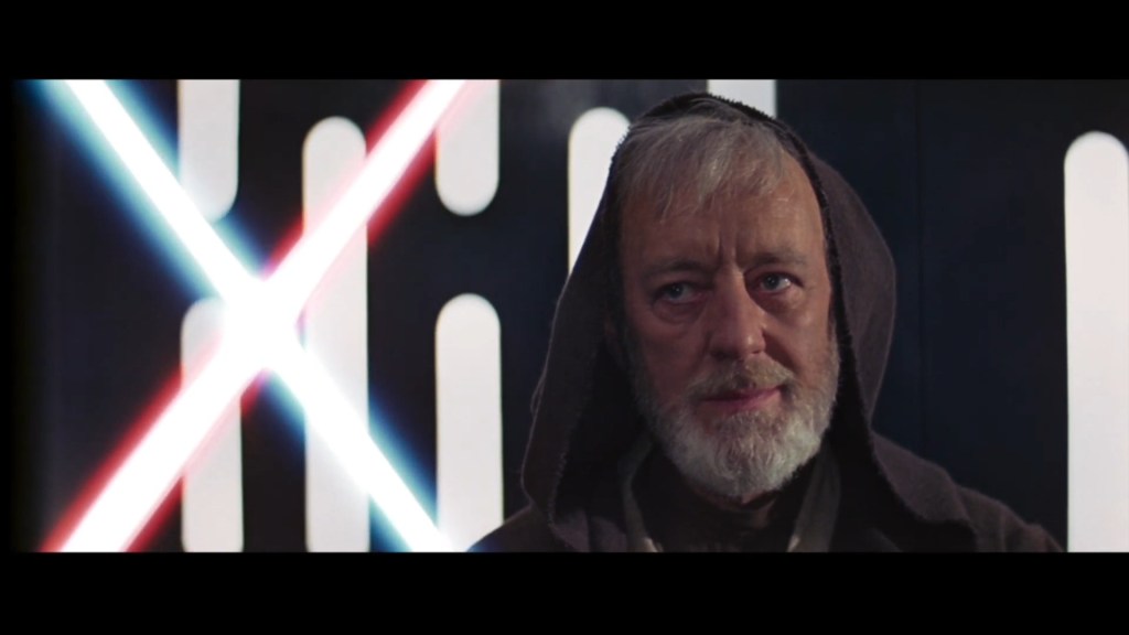 Obi-Wan Kenobi (Sir Alec Guinness) accepts his fate in Star Wars - Episode IV: A New Hope (1977), Lucasfilm