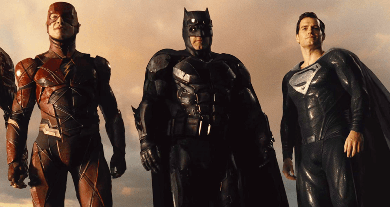 The Flash (Ezra Miller), Batman (Ben Affleck) and Superman (Henry Cavill) stand triumphant over Darkseid (Ray Porter) in Zack Snyder's Justice League (2021), Warner Bros. Pictures