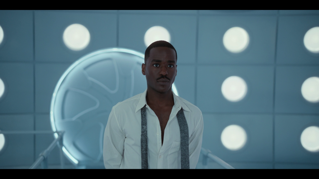 The 15th Doctor (Ncuti Gatwa) takes his first step into the TARDIS in Doctor Who Special 303 “The Giggle" (BBC)