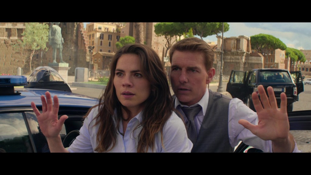 Ethan (Tom Cruise) and Grace (Hayley Atwell) find themselves at the mercy of Entity's mercenaries in Mission Impossible - Dead Reckoning: Part One (2023), Paramount Pictures