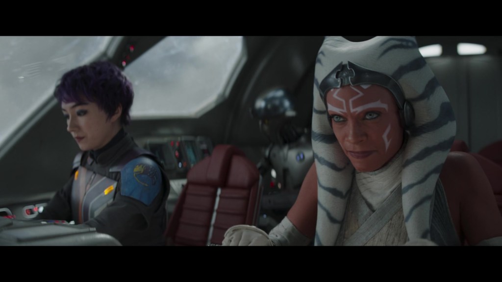 Ahsoka Tano (Rosario Dawson) and Sabine (Natasha Liu Bordizzo) accept that they're now trapped in a different galaxy in Ahsoka Season 1 Episode 8 "Part Eight: The Jedi, the Witch, and the Warlord" (2023), Disney