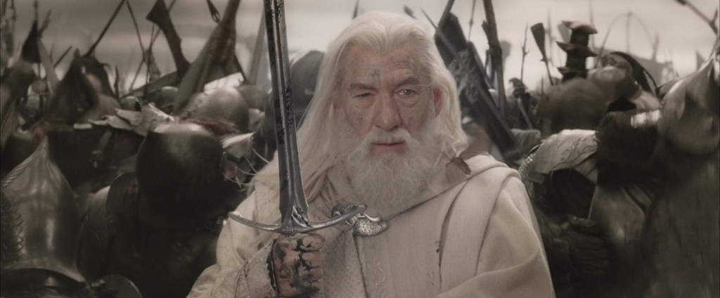 Gandalf the White (Sir Ian McKellen) draws his blade against the forces of Mordor during the Battle of the Morannon in The Lord of the Rings: Return of the King (2003), New Line Cinema