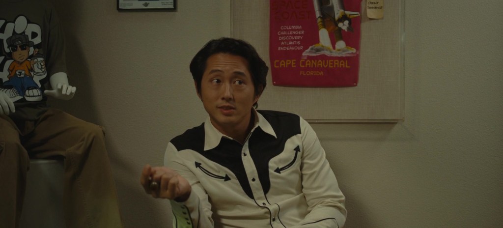 Ricky "Jupe" Park (Steven Yeun) recounts his childhood in Nope (2022), Universal Pictures