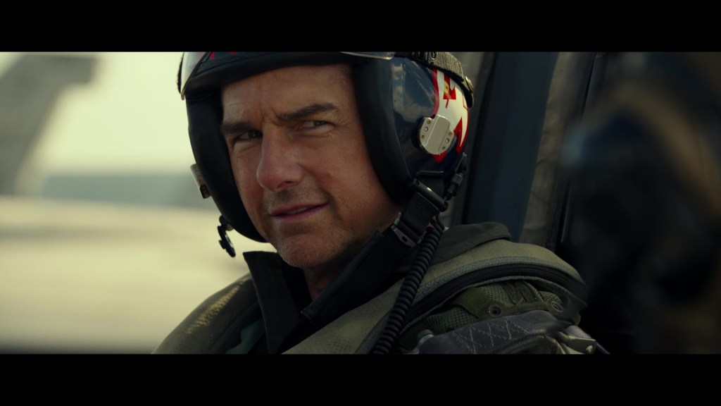 Maverick (Tom Cruise) shows his team how to fly in Top Gun: Maverick (2022), Paramount Pictures