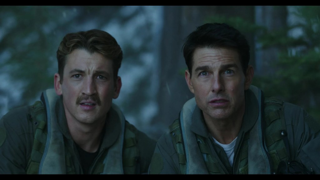 Maverick (Tom Cruise) and Rooster (Miles Teller) realize an outdated F-14 is their only way out in Top Gun: Maverick (2022), Paramount Pictures
