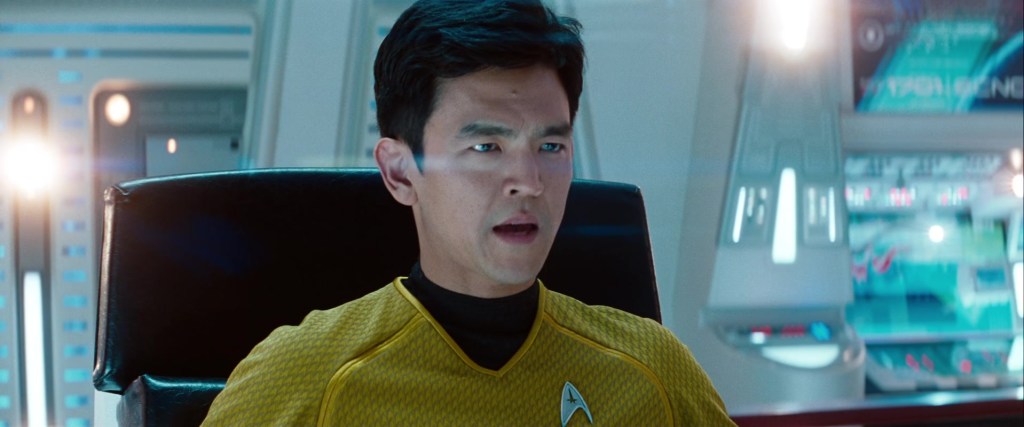 Sulu (John Cho) takes temporary control of the enterprise in Star Trek Into Darkness (2013), Paramount Pictures