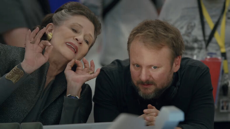 Carrie Fisher and Rian Johnson trade notes during the filming of Star Wars: Episode VIII - The Last Jedi (2017), Disney