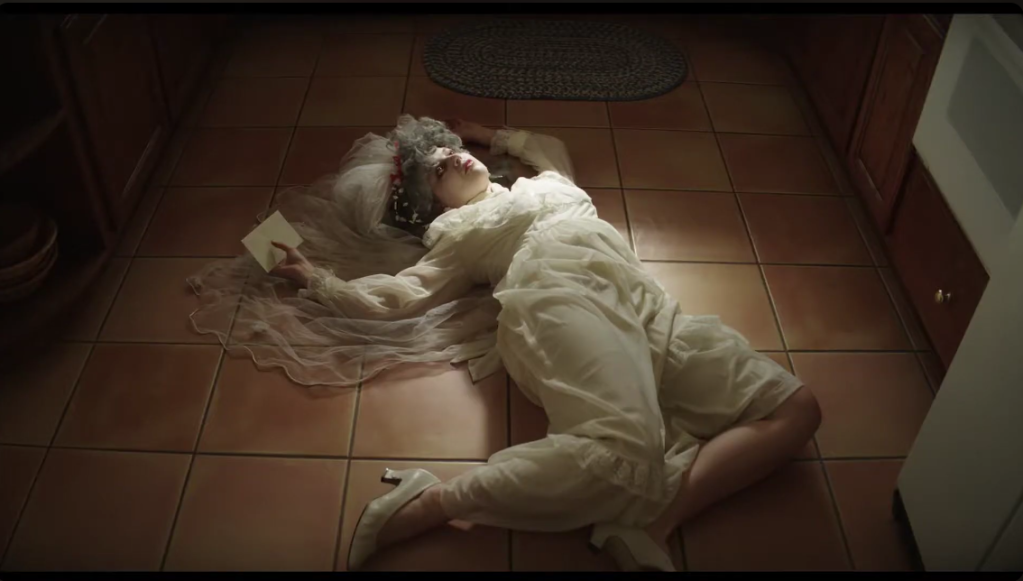 Anna Grace Barlow plays dead in Dramarama (2020), 1091/Ambrosia Films
