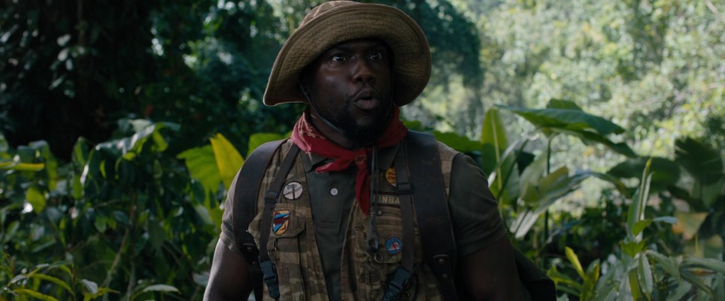 Fridge (Kevin Hart) finds himself in a different body in Jumanji: Welcome to the Jungle (2017), Columbia Pictures
