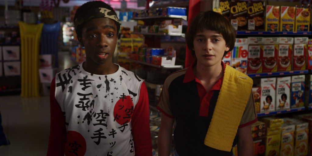 Caleb McLaughlin as Lucas Sinclair and Noah Schnapp as Will Byers in STRANGER THINGS. Cr. Courtesy of Netflix © 2019