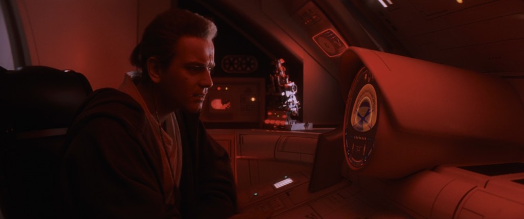 Obi-Wan Kenobi (Ewan McGregor) is surprised by Anakin Skywalker's (Jake Lloyd) Midi-chlorian count in Star Wars Episode I: The Phantom Menace (1999), Lucasfilm Ltd.