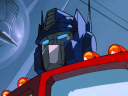 Optimus Prime (Peter Cullen) faces Megatron (Frank Welker) in Transformers: The Movie (1986), Marvel Productions