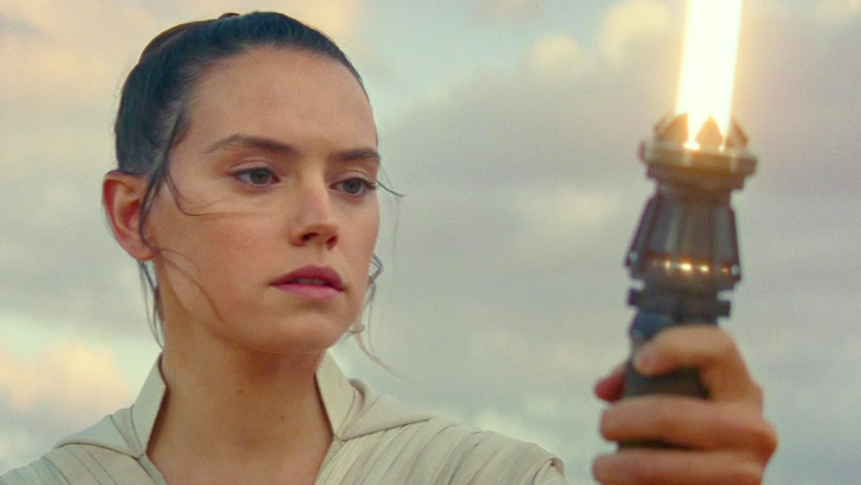 Rey (Daisy Ridley) ignites her lightsaber in Star Wars: Episode IX - The Rise of Skywalker (2019), Disney