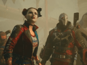 Captain Boomerang (Daniel Lapaine), Harley Quinn (Tara Strong), Deadshot (Bumper Robinson), and King Shark (Samoa Joe) stare in confusion through dust and debris via Suicide Squad: Kill the Justice League (2023), Warner Bros. Games