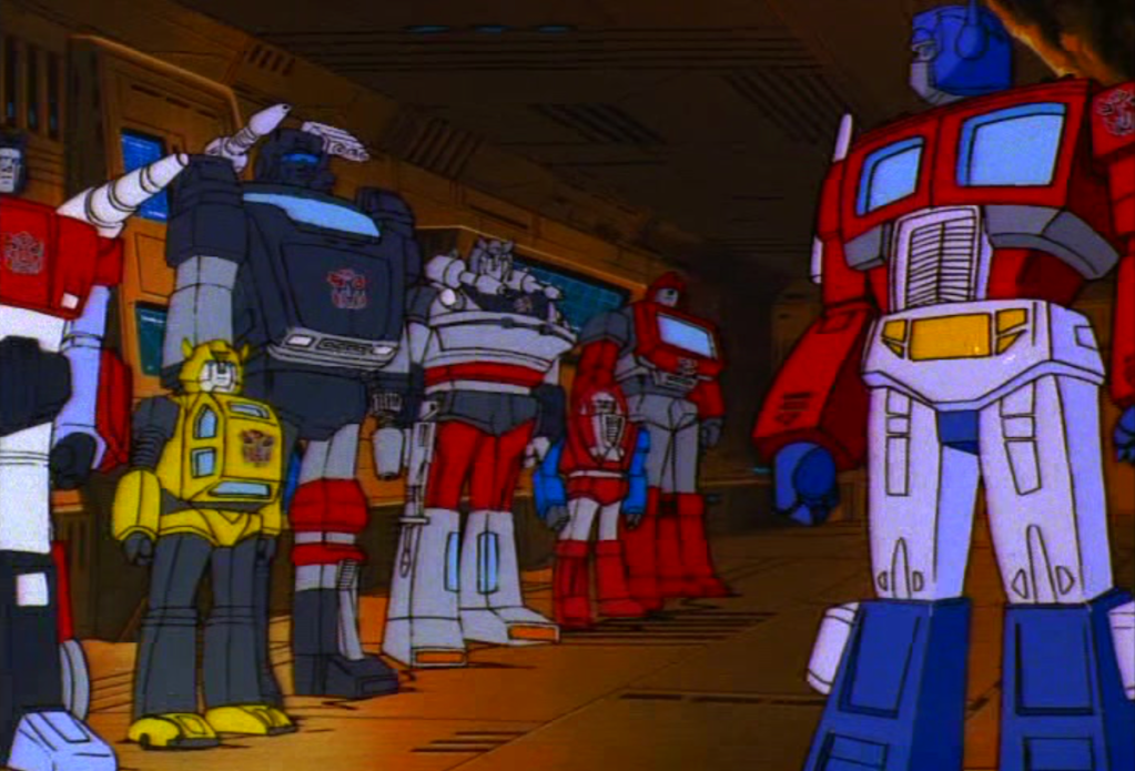 The Autobots are ready to transform and roll out in Transformers Season 1 Episode 7 "S.O.S. Dinobots" (1984), Marvel Productions