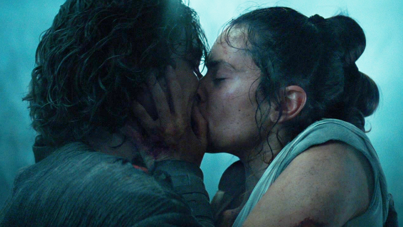 Rey (Daisy Ridley) shares her first and last kiss with Kylo Ren (Adam Driver) in Star Wars: Episode IX - The Rise of Skywalker (2019), Disney