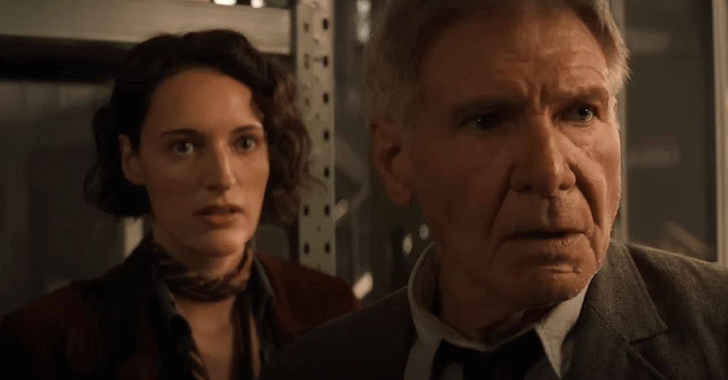 Indiana Jones (Harrison Ford) and Helena Shaw (Phoebe Waller-Bridge) are cornered by Voller's thugs in "Indiana Jones and the Dial of Destiny" (2023), Walt Disney Studios