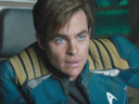 Captain Kirk (Chris Pine) takes a breather after crash landing the U.S.S. Enterprise in Star Trek Beyond (2016), Paramount Pictures