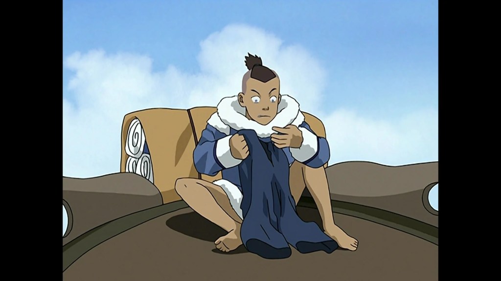 Katara (Mae Whitman) tells Sokka (Jack DeSena) to sew his own clothes in Avatar: The Last Airbender Season 1 Episode 4 "The Warriors of Kyoshi" (2005), Nickelodeon