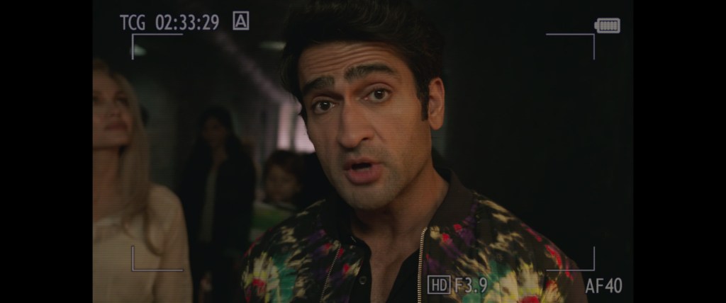Kingo (Kumail Nanjiani) attempts to make a documentary out of his travels in Eternals (2021), Marvel Entertainment