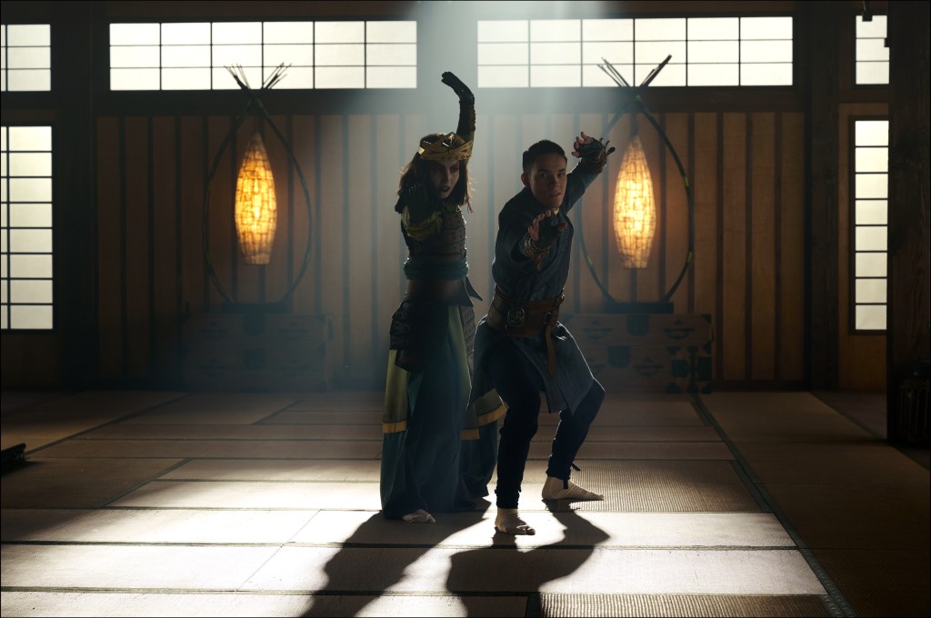 Suki (Maria Zhang) gives Sokka (Ian Ousley) some combat training in Avatar: The Last Airbender (2024), Netflix. Cr. Robert Falconer/Netflix © 2024
