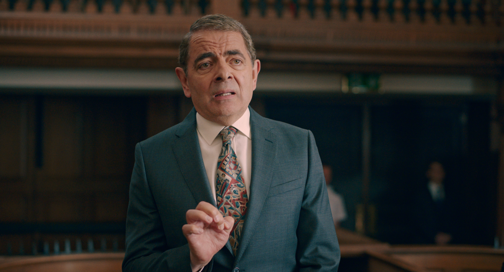 House sitter Trevor Bingley (Rowan Atkinson) attempts to explain his actions in court in Man vs. Bee Season 1 Episode 1 "Chapter 1" (2022), Netflix