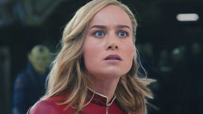 Captain Marvel (Brie Larson) watches on in horror as the Kree invade Tarnax in The Marvels (2023), Marvel Entertainment