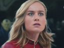 Captain Marvel (Brie Larson) watches on in horror as the Kree invade Tarnax in The Marvels (2023), Marvel Entertainment